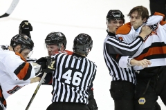 Referees attempt to break up a brawl in the third period of the Kelly Cup Playoff West Conference quarterfinal game between the Cincinnati Cyclones and the Fort Wayne Komets at US Bank Arena in downtown Cincinnati, on Wednesday, April 20, 2016. The Cyclones fell to 2-1 in the series with an 8-0 loss to the Komets.
