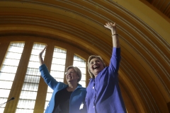 Presumed democratic party presidential nominee Hillary Clinton waves after finishing her speech with Senator Elizabeth Warren during a campaign stop at the Cincinnati Museum Center in the Queensgate neighborhood of Cincinnati on Monday, June 27, 2016.