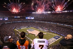 Fireworks burst in the air above the stadium as a Uniter States shaped flag is unfurled on the field during the National Anthem before the first quarter of the NFL Week 10 game between the New York Giants and the Cincinnati Bengals at MetLife Stadium in East Rutherford, N.J., on Monday, Nov. 14, 2016.