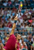 Roger Federer delivers a serve during the second set of the quarterfinal match between Feliciano Lopez (ESP) and Roger Federer (SUI) in the Western & Southern Open tournament at the Lindner Family Tennis Center in Mason, Ohio, on Friday, Aug. 21, 2015. Federer defeated Lopez in straight sets, advancing to face Andy Murray in the semifinals.